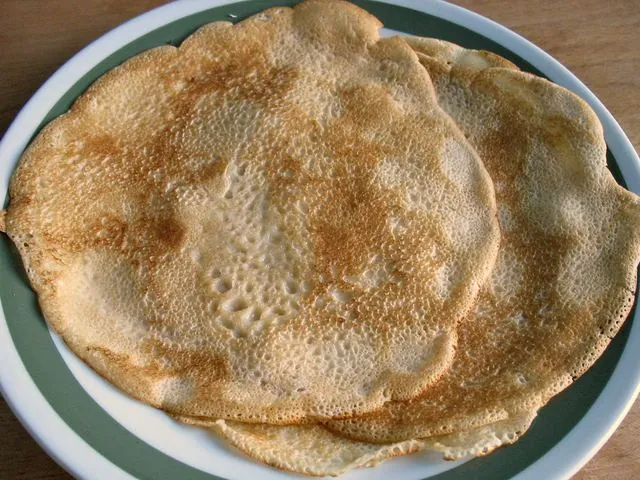 Blinis con crema agria